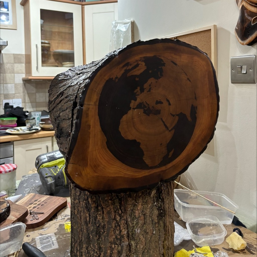 Image of the front of the tabernacle where an image of the earth can be seen